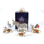 Seven Royal Crown Derby figures, including two Donkeys (one in the original box), a Donkey Foal,