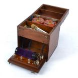 An early massage machine in a mahogany case, with three apparent settings, 19cm x 17cm x 17cm