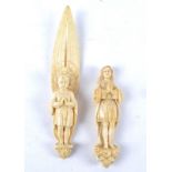 A 19th Century Dieppe carved ivory letter opener in the form of an angel, the boy angel dressed in