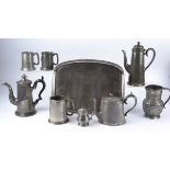 A small collection of pewter wares, to include a jug with a heraldic eagle, height 17.5cm and a