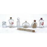 A small collection of 20th Century scent bottles, including two modelled as puppies, one as a
