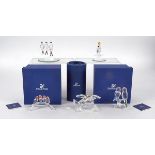 Five Swarovski Crystal models of birds, including parrots and tropical birds, all in original boxes,