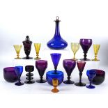A small collection of 19th and 20th Century coloured glassware in amethyst, amber and Bristol