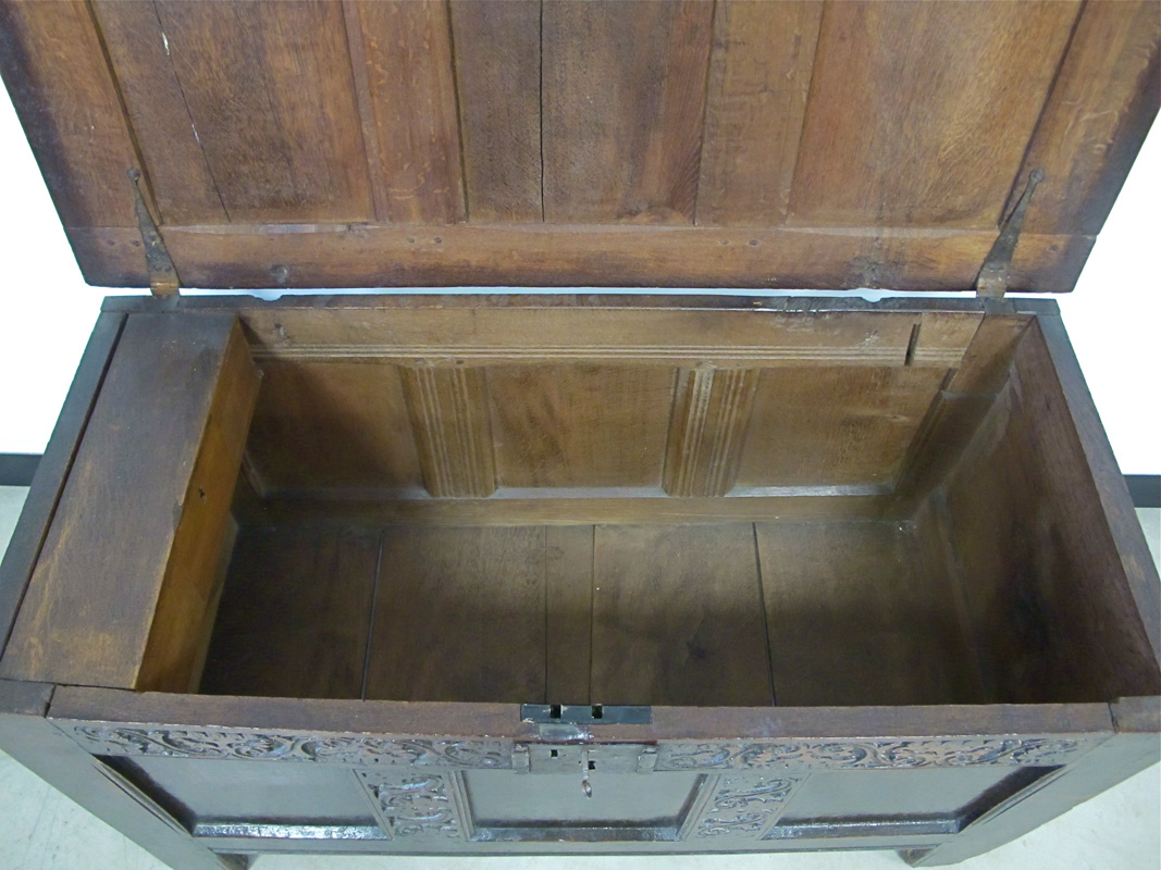 An antique oak three panelled coffer with carved frieze, some later alterations including a - Image 2 of 2