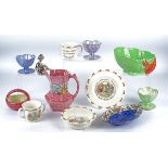 A small group of Maling Ware lustre items to include a jug with swirling pink decoration and