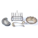 A hallmarked Sheffield silver toast rack, together with two Sheffield silver sauce ladles, a