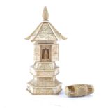 A Meiji period carved ivory model of a Zushi temple, the roof carved with a Phoenix and lotus