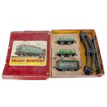 A French Hornby 0 Gauge clockwork M6 Train Set with M steam Locomotive Tender and Coaches, the set