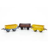 Three Meccano-branded Hornby 0 Gauge French and British Wagons, a pre-war French rotary tipper in