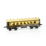 An uncommon French Hornby O Gauge 'Golden Arrow' Wagons-Lits Coach, in CIWL brown/cream livery as