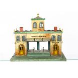 An Early Märklin Gauge 1 English-market Station, in hand-painted buff finish with wood-grain