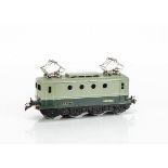 A Post-war French Hornby 0 Gauge 20v electric T-BB Locomotive, in SNCF two-tone green with silver