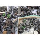 An Assortment of Leeds (LMC) O Gauge mechanisms wheels and other spare parts, including 4- and 6-