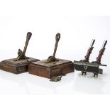 Signal Box Lever Frame Levers, four levers, two brass examples mounted on wooden blocks, inscribed