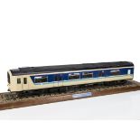 An approximately 2?" Gauge (1/20 scale) static display model class 150 DMU Driving Coach, believed