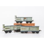 French Hornby 0 Gauge No 2 NORD Bogie Freight Stock, three two-tone grey luggage vans, two with