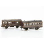 Two 'Believed-to-be' Milbro O Gauge Wooden 4-wheel LMS Coaches, both in dark maroon LMS livery, as