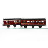 Two Exley 0 Gauge K6-type 6-wheeled LMS Coaches, in LMS crimson as 3rd class no 200, with brake/