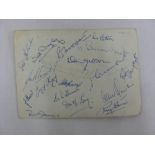 1955/56 an autographed press photograph of the whole squad, signed by all 17 players on reverse