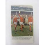 Autographs, a colour magazine picture signed by Bobby Moore & Geoff Hurst