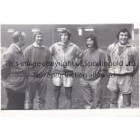 ARSENAL Seven black & white Press photographs of players in training at Highbury: 11" X 8" Bertie