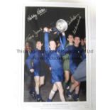 NOBBY STILES Limited Edition print, number 34 of 75 issued, showing Nobby Stiles holding aloft the