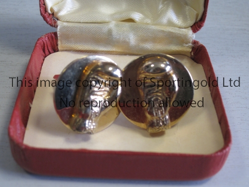 ROCKY MARCIANO V EZZARD CHARLES 1954 A pair of cufflinks each with a boxing glove on the outside and