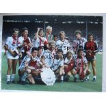 MANCHESTER UTD 1983 Col 16 x 12 photo of the 1983 Charity Shield winners celebrating with their