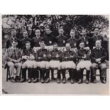 ARSENAL An 8" X 6" black & white team photograph circa 1928/9. Good