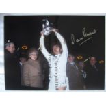 MARTIN PETERS 1973 Col 16 x 12 photo of the Tottenham Captain holding aloft the League Cup after