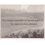 FOOTBALL PHOTOGRAPH 1940'S An 8" X 6" black & white photograph taken from the stands showing action,