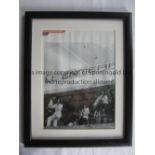 ROLLING STONES / AUTOGRAPHS A 12" X 9" framed and glazed black & white picture of the bank on