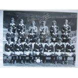 MANCHESTER UTD 1973 B/w 16 x 12 photo of the players posing for a squad photo at Old Trafford