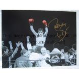 BARRY MCGUIGAN B/w 16 x 12 photo of McGuigan celebrating in the ring after his memorable victory