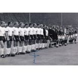 WILLI SCHULZ B/w 12 x 8 photo depicting the West German team standing shoulder to shoulder prior