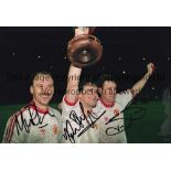 MANCHESTER UTD Col 12 x 8 photo of Man United's Hughes, Bruce and Phelan holding aloft the