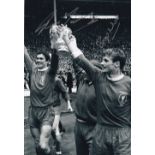 LIVERPOOL B/w 12 x 8 photo of Ron Yeats and Roger Hunt holding aloft the FA Cup during a lap of