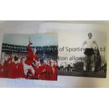 1966 WORLD CUP / BOBBY MOORE Two large photographs. Colour 15" X 12" of Bobby Moore holding the