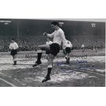 ALAN GILZEAN B/w 12 x 8 photo of the Tottenham centre-forward in a full length action pose in