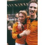 DENIS LAW Col 12 x 8 photo showing Wolves Derek Dougan hugging Manchester City's Denis Law following