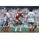 ENGLAND Col 12 x 8 photo of Bryan Robson jumping into the arms of Terry Butcher after scoring