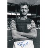 DAVE DUNMORE B/w 12 x 8 photo of the West Ham United centre-forward posing for photographers prior