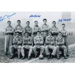 ENGLAND B/w 12 x 8 photo showing England Internationals posing for a team photo, during a training