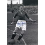 DON GIBSON B/w 12 x 8 photo of Man United right-half Don Gibson in an action pose for