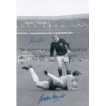 LAW AND BANKS B/w 12 x 8 photo showing England goalkeeper Gordon Banks pouncing on the ball ahead of