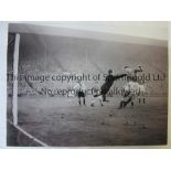 TOM FINNEY A 16 x 12 photo of the winger heading toward the German goal during a friendly