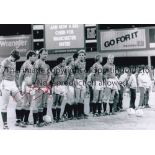 FRANK WORTHINGTON A b/w 12 x 8 photo of the Man United players lining up including guest player