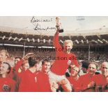 BOBBY MOORE AUTOGRAPH A colour 8" x 6" signed famous picture of Moore being chaired on the lap of