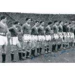 MANCHESTER UNITED A b/w 12 x 8 photo of the Busby Babes lining up shoulder to shoulder for the