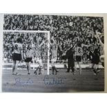 MANCHESTER CITY A b/w 16 x 12 photo of Denis Law celebrating with team mate Colin Bell who had